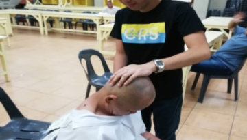 The physiotherapist applied the overpressure on the back of the participant’s head while he bends his neck